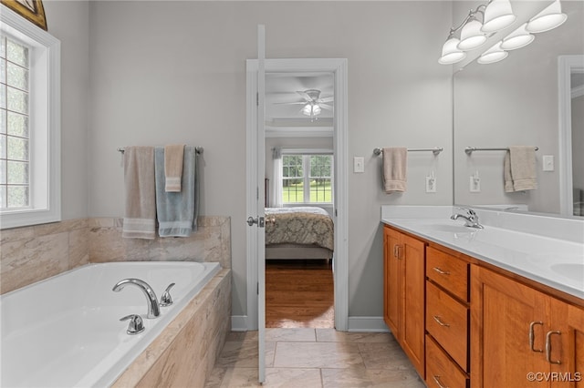 1638 Olde Links Dr, Powhatan, VA 23139 - full bath featuring double vanity, a garden tub, ensuite bathroom, a ceiling fan, and tile patterned flooring