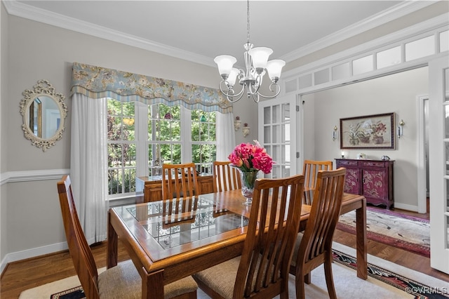 1638 Olde Links Dr, Powhatan, VA 23139 - dining space with crown molding, a chandelier, and wood finished floors