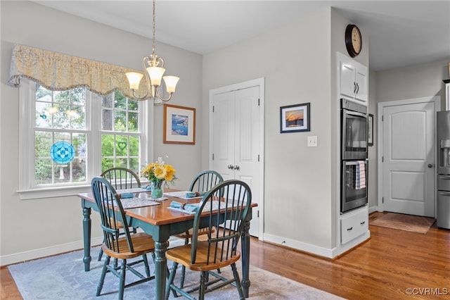 1638 Olde Links Dr, Powhatan, VA 23139 - dining space featuring a chandelier and wood finished floors