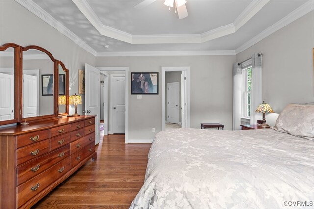 1638 Olde Links Dr, Powhatan, VA 23139 - bedroom featuring a raised ceiling, dark wood-style floors, and ceiling fan