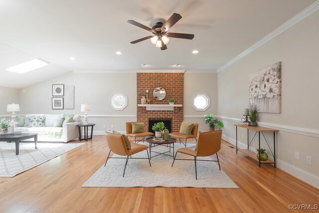 10801 Cherry Hill Dr, Glen Allen, VA 23059 - living area featuring wood finished floors, a brick fireplace, a ceiling fan, ornamental molding, and recessed lighting