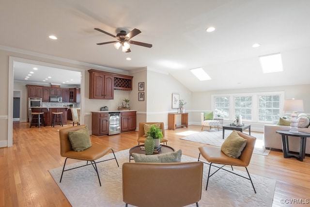 10801 Cherry Hill Dr, Glen Allen, VA 23059 - living room with wine cooler, bar with sink, ornamental molding, light wood-type flooring, and recessed lighting