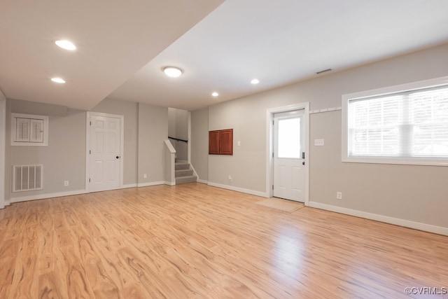 10801 Cherry Hill Dr, Glen Allen, VA 23059 - unfurnished living room with stairway, recessed lighting, and light wood-type flooring