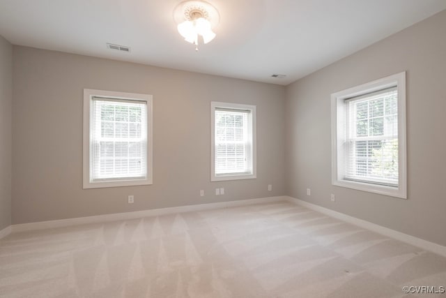10801 Cherry Hill Dr, Glen Allen, VA 23059 - empty room featuring light carpet and healthy amount of natural light