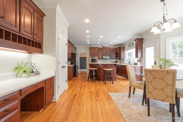 10801 Cherry Hill Dr, Glen Allen, VA 23059 - dining space featuring ornamental molding, light wood finished floors, a chandelier, recessed lighting, and an office area