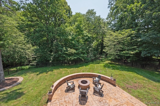 10801 Cherry Hill Dr, Glen Allen, VA 23059 - fenced backyard featuring an outdoor fire pit and a patio