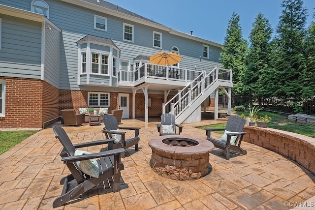 10801 Cherry Hill Dr, Glen Allen, VA 23059 - view of patio with stairway, a wooden deck, and an outdoor living space with a fire pit