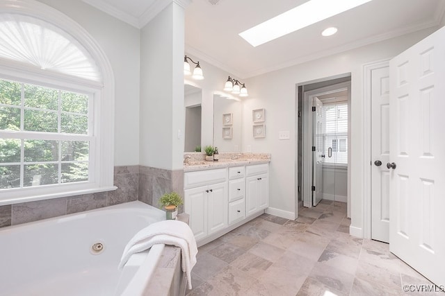 10801 Cherry Hill Dr, Glen Allen, VA 23059 - bathroom with vanity, a whirlpool tub, a skylight, and crown molding