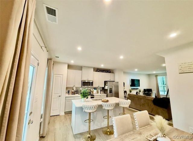 2007 Turtle Pkwy, Henrico, VA 23150 - dining space with light wood-style floors and recessed lighting