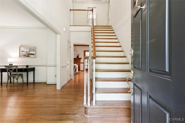 2019 Hornes Lake Rd, Williamsburg, VA 23185 - entryway with wood finished floors, stairway, and a high ceiling