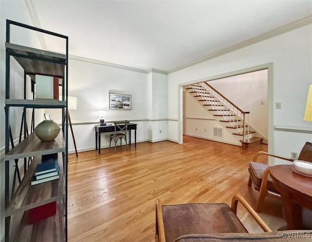 2019 Hornes Lake Rd, Williamsburg, VA 23185 - living area featuring stairway, crown molding, and wood finished floors