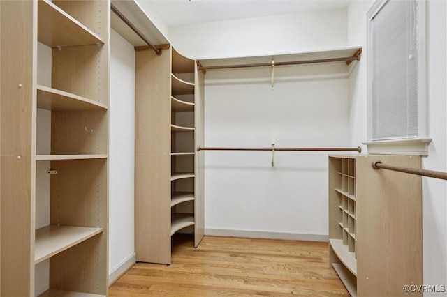 2019 Hornes Lake Rd, Williamsburg, VA 23185 - walk in closet featuring wood finished floors