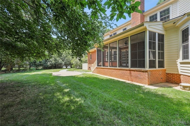 2019 Hornes Lake Rd, Williamsburg, VA 23185 - view of grassy yard featuring a sunroom