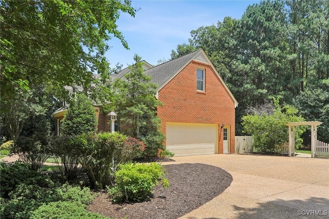 2019 Hornes Lake Rd, Williamsburg, VA 23185 - view of property exterior with brick siding, driveway, and an attached garage