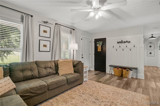 453 Manquin Dr, King William, VA 23009 - living room with a ceiling fan, wood finished floors, and a textured ceiling