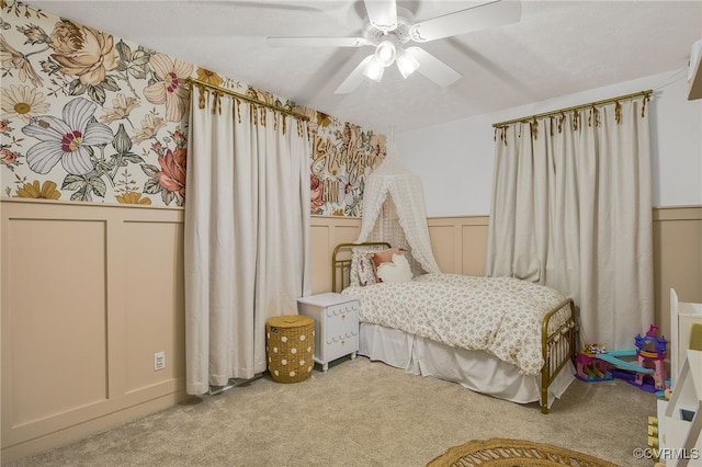 453 Manquin Dr, King William, VA 23009 - bedroom featuring carpet, a decorative wall, wainscoting, and ceiling fan