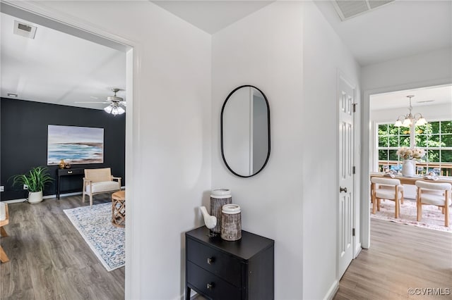 4107 Forest Vine Pl, Chesterfield, VA 23834 - hall with wood finished floors and a chandelier
