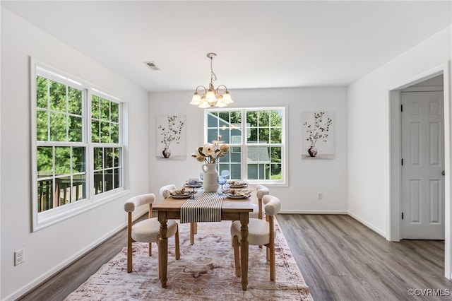4107 Forest Vine Pl, Chesterfield, VA 23834 - dining space with wood finished floors and a chandelier