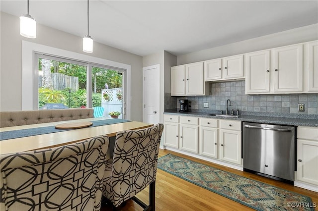 14715 Boyces Cove Dr, Midlothian, VA 23112 - kitchen featuring dishwasher, wood finished floors, backsplash, white cabinets, and decorative light fixtures