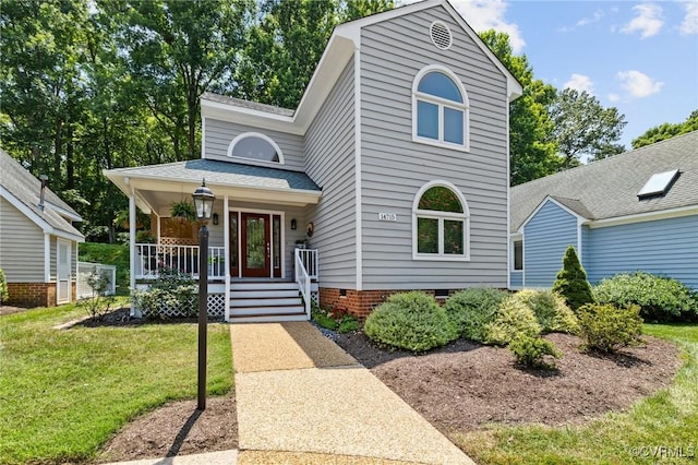 14715 Boyces Cove Dr, Midlothian, VA 23112 - view of front of house with a porch, a front lawn, and roof with shingles
