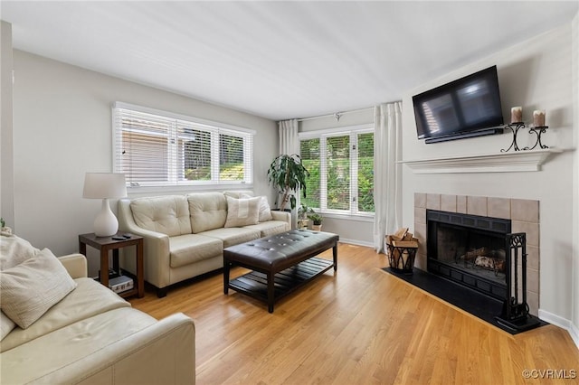 14715 Boyces Cove Dr, Midlothian, VA 23112 - living area featuring light wood-style floors and a fireplace