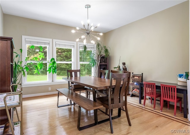 10598 Lambeth Rd, Glen Allen, VA 23060 - dining room featuring a chandelier and light wood-type flooring