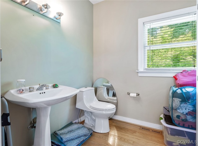 10598 Lambeth Rd, Glen Allen, VA 23060 - half bath with toilet and wood finished floors