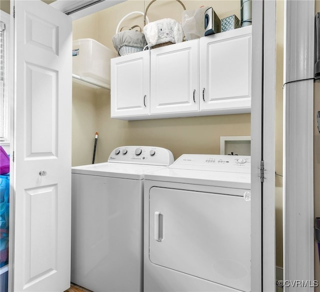 10598 Lambeth Rd, Glen Allen, VA 23060 - laundry area featuring cabinet space and washing machine and dryer