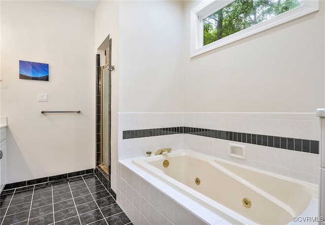 10598 Lambeth Rd, Glen Allen, VA 23060 - bathroom featuring a jetted tub, vanity, tile patterned flooring, and a shower