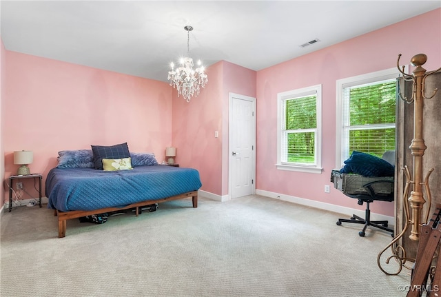 10598 Lambeth Rd, Glen Allen, VA 23060 - carpeted bedroom featuring baseboards and a chandelier