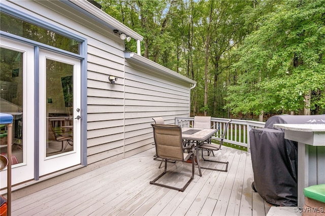 10598 Lambeth Rd, Glen Allen, VA 23060 - wooden terrace with outdoor dining space and a grill