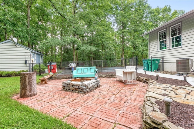10598 Lambeth Rd, Glen Allen, VA 23060 - view of patio with an outdoor fire pit and view of scattered trees