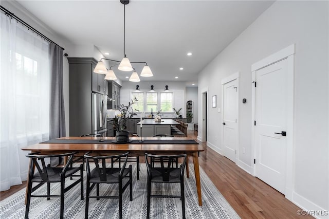 2114 N Ave, Richmond, VA 23222 - dining room with wood finished floors and recessed lighting
