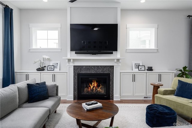 2114 N Ave, Richmond, VA 23222 - living area with wood finished floors, a fireplace, and recessed lighting