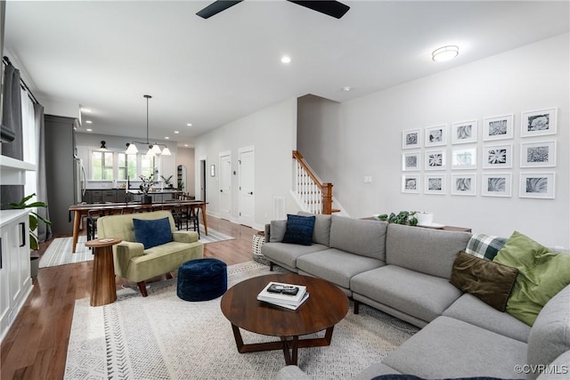 2114 N Ave, Richmond, VA 23222 - living area featuring stairs, dark wood finished floors, ceiling fan, recessed lighting, and a chandelier