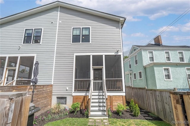 2114 N Ave, Richmond, VA 23222 - rear view of house featuring a sunroom