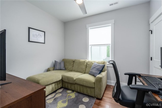 2114 N Ave, Richmond, VA 23222 - living area with wood finished floors and ceiling fan