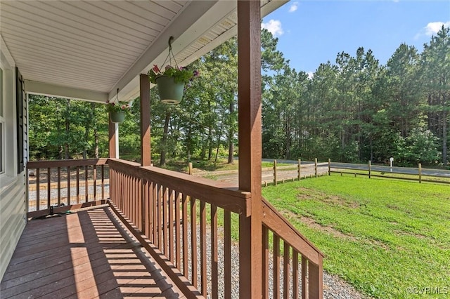 520 Monte Verde Rd, Center Cross, VA 22437 - wooden porch with a yard and view of wooded area
