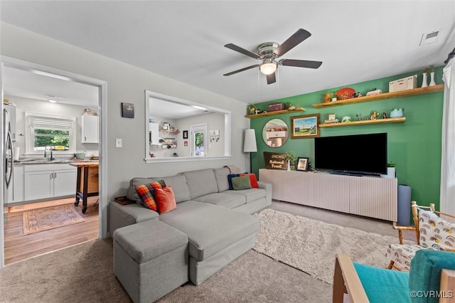 520 Monte Verde Rd, Center Cross, VA 22437 - living area featuring ceiling fan and light colored carpet