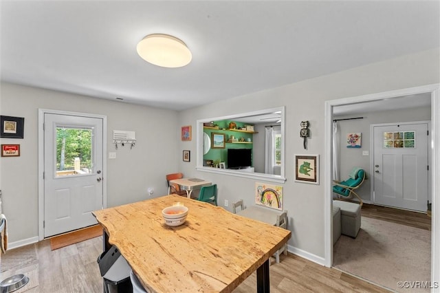520 Monte Verde Rd, Center Cross, VA 22437 - dining space with light wood-style floors and plenty of natural light