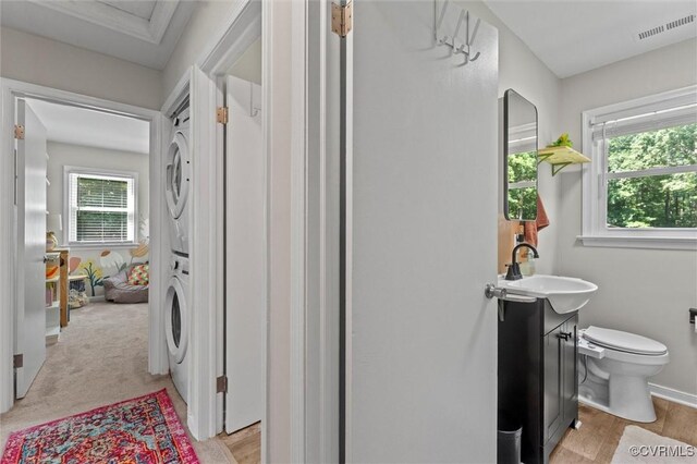 520 Monte Verde Rd, Center Cross, VA 22437 - bathroom featuring stacked washing machine and dryer and vanity