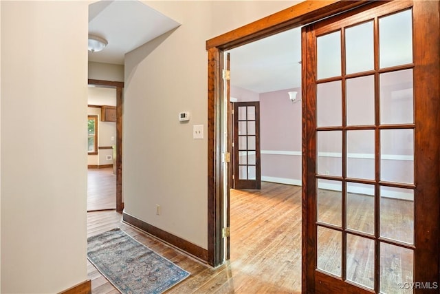 3180 Judes Ferry Rd, Powhatan, VA 23139 - hallway featuring wood finished floors and french doors