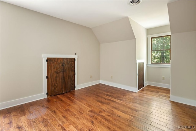 3180 Judes Ferry Rd, Powhatan, VA 23139 - additional living space with wood-type flooring and vaulted ceiling