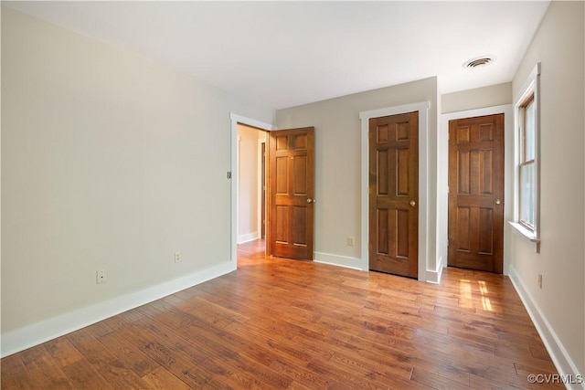 3180 Judes Ferry Rd, Powhatan, VA 23139 - unfurnished bedroom featuring wood finished floors