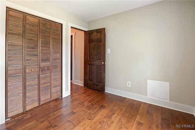 3180 Judes Ferry Rd, Powhatan, VA 23139 - unfurnished bedroom with a closet and wood finished floors