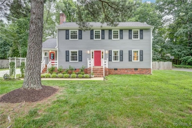 10903 Gayton Rd, Henrico, VA 23238 - colonial home featuring crawl space, a chimney, and view of wooded area