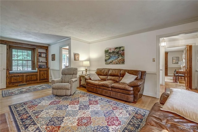 10903 Gayton Rd, Henrico, VA 23238 - living area with wood finished floors, crown molding, and wainscoting