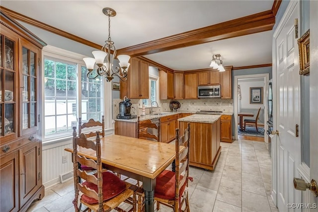 10903 Gayton Rd, Henrico, VA 23238 - dining area featuring a chandelier, light tile patterned floors, and crown molding
