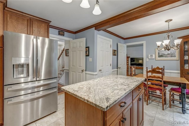 10903 Gayton Rd, Henrico, VA 23238 - kitchen featuring stainless steel refrigerator with ice dispenser, a chandelier, a kitchen island, crown molding, and wainscoting