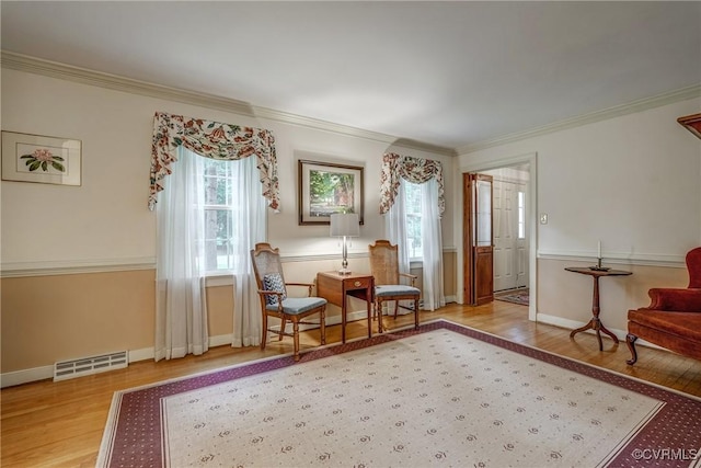 10903 Gayton Rd, Henrico, VA 23238 - sitting room with light wood-style floors and ornamental molding
